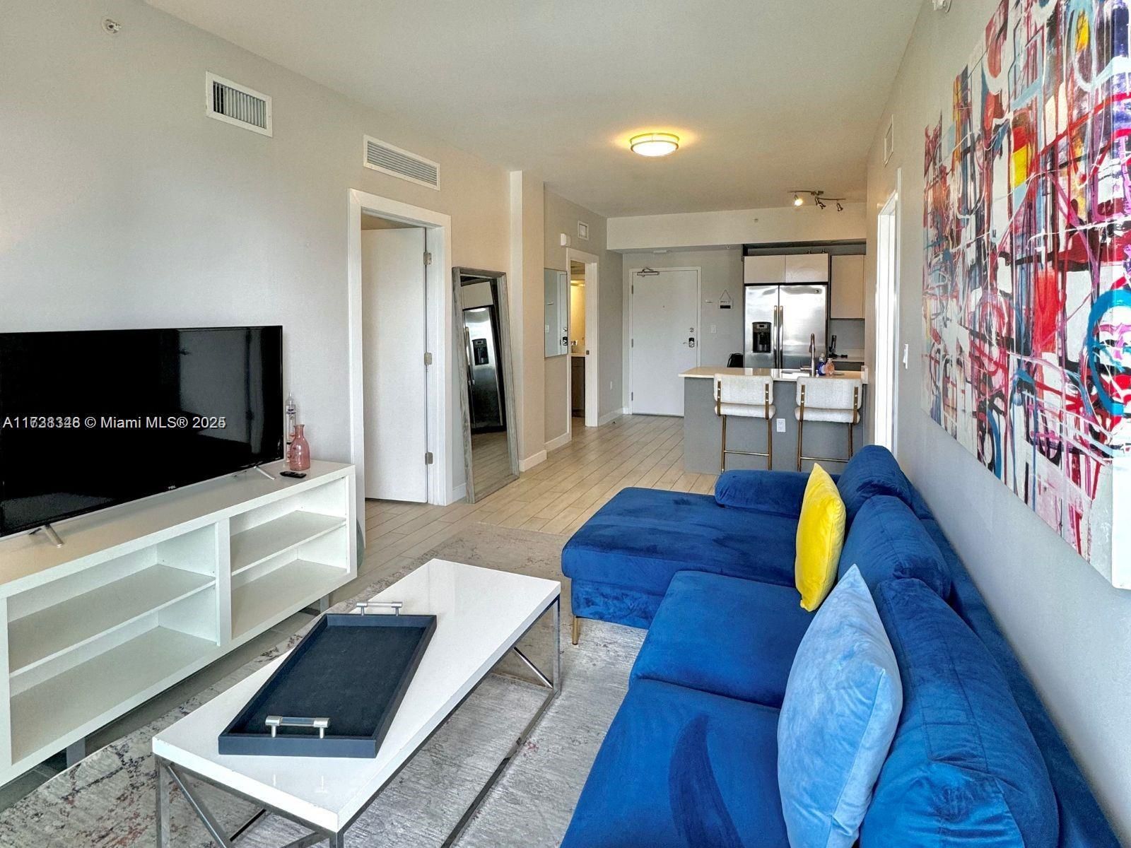 321 NE 26th 703-1